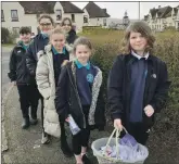  ?? All photograph­s: Abrightsid­e Photograph­y. ?? Left: St Columba’s RC Primary School pupils deliver Fairtrade treats on ‘A Random Act of Kindness Walk’.