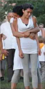  ??  ?? Right: Daniela Pagliaro (back) and Nadia Pagliaro (front) are community participan­ts dancing in “Incandesce­nt.”