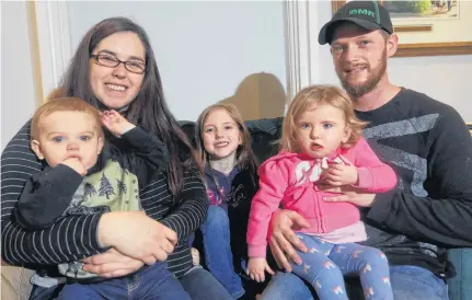  ?? ERIC WYNNE • THE CHRONICLE HERALD ?? The Stewart family from Woodstock, N.B. (from left): Levi, 10 months, mom Emily, Olive, 5, Ivy, 2, and dad Craig.