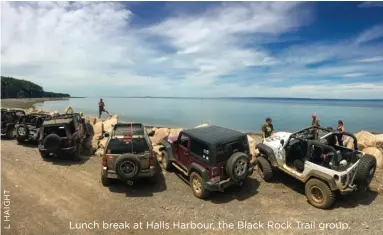  ??  ?? Lunch break at Halls Harbour, the Black Rock Trail group.