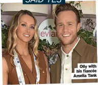  ?? ?? Olly with his fiancée Amelia Tank