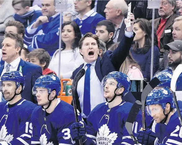  ?? NATHAN DENETTE/THE CANADIAN PRESS ?? Coach Mike Babcock is always thinking about what he can do to make his Toronto Maple Leafs successful, as the team was in Boston Saturday.