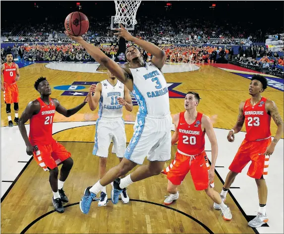  ?? — GETTY IMAGES ?? Kennedy Meeks of the North Carolina Tar Heels goes up for a basket against Syracuse during the second half of their NCAA men’s Final Four semifinal game in Houston Saturday night. The Tar Heels will play Villanova for the national title on Monday.