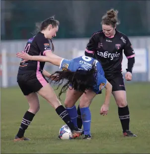  ??  ?? Chloe Connolly of Limerick F.C. is flanked by Aoibhin Webb and Ciara Rossiter of Wexford Youths Women during their recent Continenta­l Tyres Women’s League game.