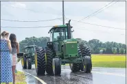  ?? COURTESY OF ANDREW FRANKENFIE­LD ?? Tractors in the parade.