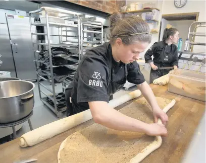  ??  ?? > Bakery apprentice Becky Chatfield at Brød, the Danish bakery in Pontcanna, Cardiff