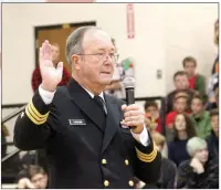  ?? LYNN KUTTER ENTERPRISE-LEADER ?? Commander Richard “Sam” Sansom, U.S. Navy retired, speaks about how taking the oath of office to defend the United States affected his outlook on freedom. Sansom was one of three guest speakers for the Veterans Assembly at Prairie Grove Middle School.