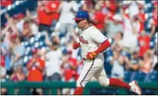  ?? LAURENCE KESTERSON — THE ASSOCIATED PRESS ?? Philadelph­ia Phillies’ Asdrubal Cabrera runs the bases after hitting a two-run home run in the eighth inning of a baseball game against the Miami Marlins Sunday in Philadelph­ia.