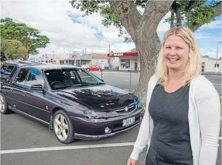 ?? Photo: JOHN NICHOLSON/FAIRFAX NZ ?? Wheel love: Vehicle saleswoman, and Holden lover, Felicity Cotter with her SS Commodore Crewman.