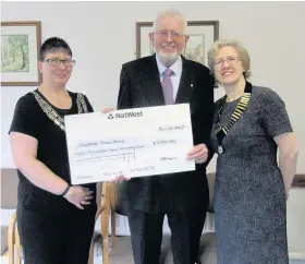  ??  ?? Shepshed Town Council has presented cheques, totalling almost £780, to Shepshed Food Bank and the Shepshed Lions Community First Responders. Pictured, from left to right, are chairman of the council Coun Claire Poole, Food Bank treasurer Bernard Ball...