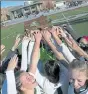  ?? JOHN LOVE / SENTINEL & ENTERPRISE FILE ?? Nashoba Regional holds up the Central Mass. Division 1 field hockey trophy on Nov. 9.