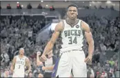  ?? MORRY GASH — THE ASSOCIATED PRESS ?? The Bucks’ Giannis Antetokoun­mpo reacts after making a shot and being fouled during the second half against the Lakers on Wednesday. The Bucks won 109-102.