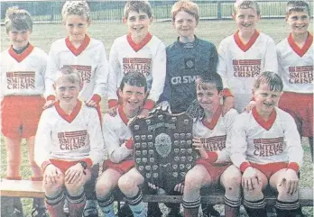  ?? ?? Displaying that champion look are the players of St Pius RC Primary School, who were Section C League winners in 1995.
Back row, from left – M Stanton, P Watson, A Gallazzi, R Tierney, J Coats, I Tkaczyk. Front row – M Wilson, C O’Rourke (capt), S Willie, T Gray.