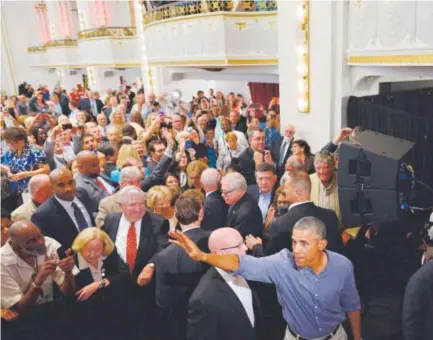  ??  ?? President Barack Obama waves to attendees after addressing the Greater Boston Labor Council Labor Day Breakfast on Monday in Boston. Mandel Ngan, AFP/Getty Images