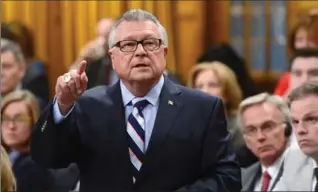  ?? SEAN KILPATRICK, THE CANADIAN PRESS ?? Public Safety Minister Ralph Goodale said two reports describe “similar serious and long-standing concerns.”