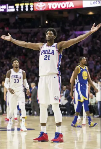  ?? CHRIS SZAGOLA — THE ASSOCIATED PRESS ?? Joel Embiid and the Sixers have 24national­ly televised games this upcoming season, including a home contest against the Bucks on Christmas Day.