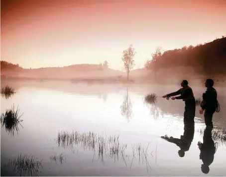  ?? Dreamstime/TNS ?? When you take your family fly-fishing, you can spend the morning testing a few trout-rich holes before taking the remainder of the day to bike or explore.