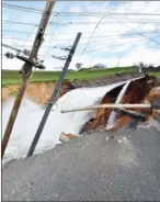  ?? HECTOR RETAMAL/AFP ?? Overflow from the damaged Guajataka River Dam is seen in San Sebastian, in the west of Puerto Rico, on Saturday following Hurricane Maria.