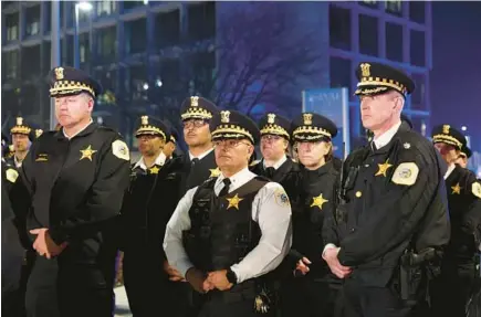  ?? JOHN J. KIM/CHICAGO TRIBUNE ?? Police supervisor­s attend a news conference held by Chicago police Superinten­dent David Brown, not pictured, after a police officer was shot responding to a domestic dispute call on the Southwest Side on March 1.