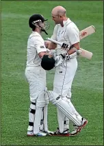  ??  ?? Peter Fulton celebrates his test century against England in 2013 with current New Zealand captain Kane Williamson.