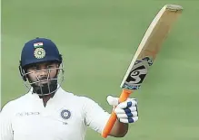  ?? AP ?? Rishab Pant celebrates scoring his half century during the second Test against West Indies in Hyderabad yesterday.