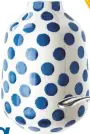  ??  ?? striking spots Ceramic spot vase, £19.50, Marks & Spencer