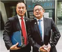  ?? PIC BY HAFIZ SOHAIMI ?? Federation of Malaysian Freight Forwarders president Alvin Chua Seng Wah (left) and council member Datuk Tony Chia leaving after meeting the Council of Eminent Persons in Kuala Lumpur yesterday.