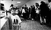  ?? CHIP SOMODEVILL­A/GETTY PHOTOS ?? A child watches as groups attend a hearing of the Senate Judiciary Committee on Tuesday.