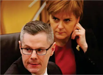  ??  ?? Tax raid: Derek Mackay and the First Minister at Holyrood on Thursday as Budget was revealed