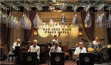  ?? — AFP ?? Never too
old: Members of the ‘Old Jazz Band’ performing at the Fairmont Peace Hotel in Shanghai.