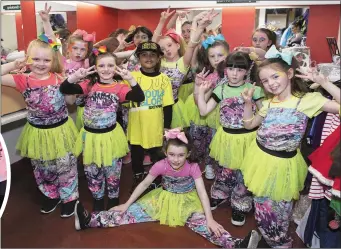  ??  ?? Fun Fit Dance group ready backstage. INSET LEFT: A performer from Sarah Middleton J Beat it dance school.