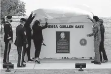  ?? Jerry Lara/staff file photo ?? The family of Spc. Vanessa Guillén unveils a sign at an entrance to Fort Hood renamed in her honor on April 19, 2021.