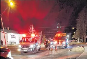  ?? SUBMITTED PHOTO BY CHELSEY LAVERN ?? Emergency personnel work at the scene of a four-unit apartment fire in Charlottet­own Tuesday night. One woman was taken to hospital, treated for smoke inhalation and released.