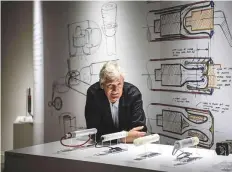  ?? AFP ?? James Dyson with products in Paris. Dyson said the Singapore factory was scheduled for completion in 2020.