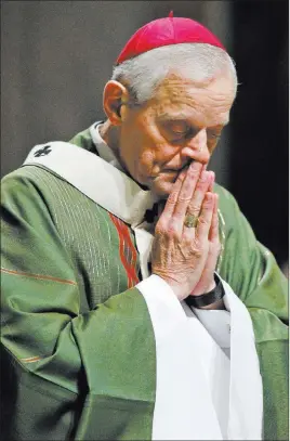  ?? Alex Brandon ?? The Associated Press file Archbishop Donald Wuerl prays in October 2010 as he celebrates Mass at the Cathedral of Saint Matthew the Apostle in Washington. He has said he has no plans to resign amid cricism over church abuse scandals.