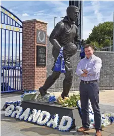  ??  ?? David Prentice, who is married to Dixie Dean’s grand- daughter Melanie, at Dixie’s statue outside Goodison Park, Everton.