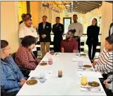  ?? PHOTO COURTESY MONTEREY COUNTY HOSPITALIT­Y ASSOCIATIO­N ?? Students listen to chef Alvin Quinol, left, at a White Tablecloth Dinner at Quail Lodge & Golf Club.