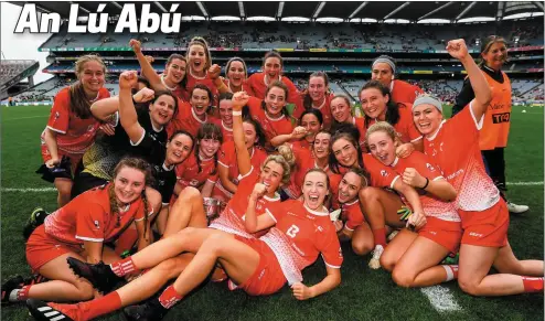  ??  ?? The victorious Louth ladies GAA team celebratin­g their All-Ireland success at Croke Park.