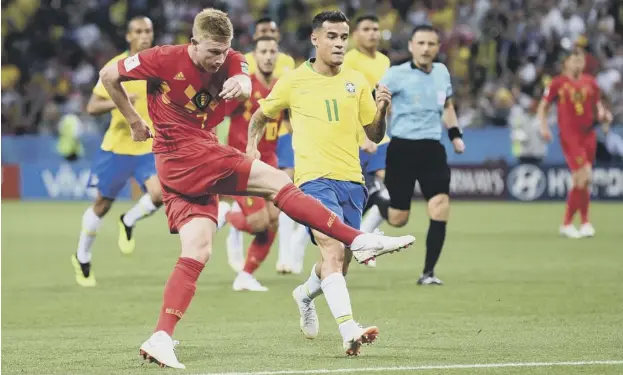  ?? PICTURE: LAURENCE GRIFFITHS/GETTY IMAGES ?? Belgium’s Kevin De Bruyne scores with a beautifull­y-hit shot to put his side 2-0 ahead against Brazil in the first half last night