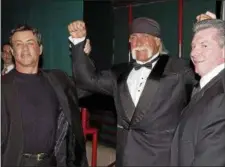  ?? MATT SAYLES - ASSOCIATED PRESS ?? Actor Sylvester Stallone, left, wrestler Hulk Hogan, center, and Vince McMahon pose for photograph­ers after the WWE Hall of Fame at the Induction Ceremony in Universal City, Calif. on April 2, 2005.