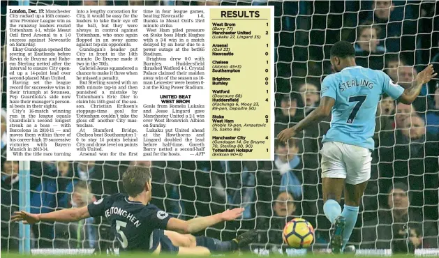  ?? — AFP AFP ?? Manchester City’s Raheem Sterling ( right) scores in their English Premier League match against Tottenham Hotspur at the Etihad Stadium in Manchester on Saturday. City won 4- 1.