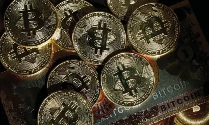  ?? ?? The seizure of bitcoins is believed to be the biggest of its kind. Photograph: Benoît Tessier/Reuters