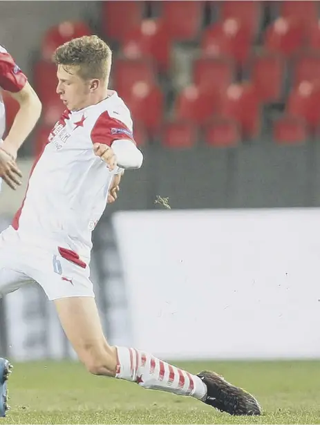  ??  ?? 2 Rangers striker Alfredo Morelos and Slavia Prague defender David Zima vie for the ball during last night’s Europa League last16 first leg clash at the Eden Arena