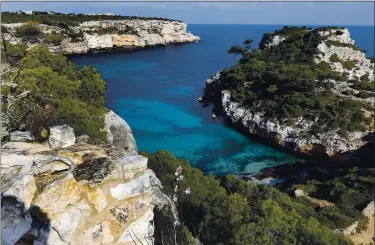  ?? ASSOCIATED PRESS ARCHIVES ?? The Spanish government will allow thousands of German tourists to visIt the Balearic island of Mallorca for a two-week period beginning in mid-June to test out how new tourism rules work in the coronaviru­s era.