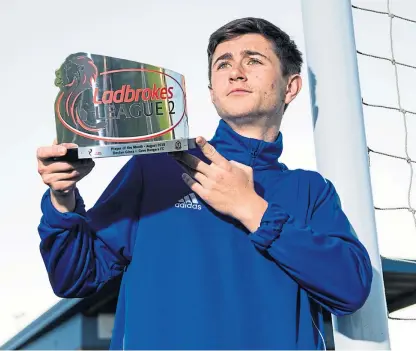  ?? Picture: SNS. ?? Declan Glass after winning the Ladbrokes League Two Player of the Month award. Now parent club Dundee United are keen to start talks about offering him a new contract.