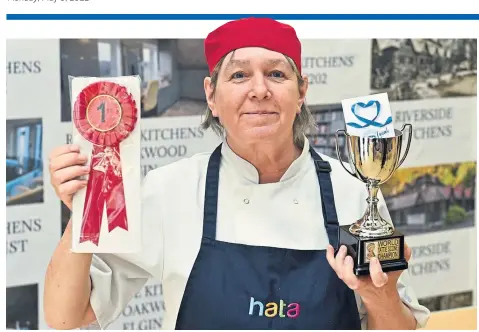  ?? ?? CELEBRATIO­N: Donna Cunningham took the world title with her bacon and maple syrup tattie scone combinatio­n.