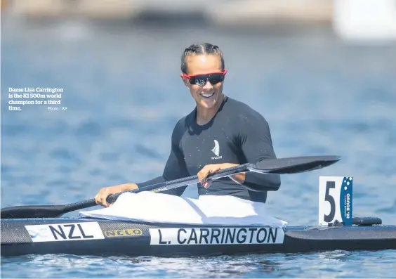  ?? Photo / AP ?? Dame Lisa Carrington is the K1 500m world champion for a third time.