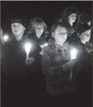  ?? By Don Treeger, AP ?? 2010 vigil: South Hadley, Mass., remembers Phoebe Prince, who hanged herself that year.