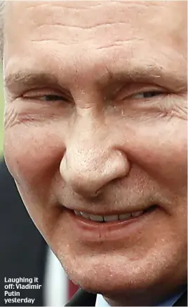  ??  ?? Laughing it off: Vladimir Putin yesterday