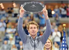  ?? (AFP) ?? Norway's Casper Ruud celebrates with the US Open runner-up trophy on Sunday